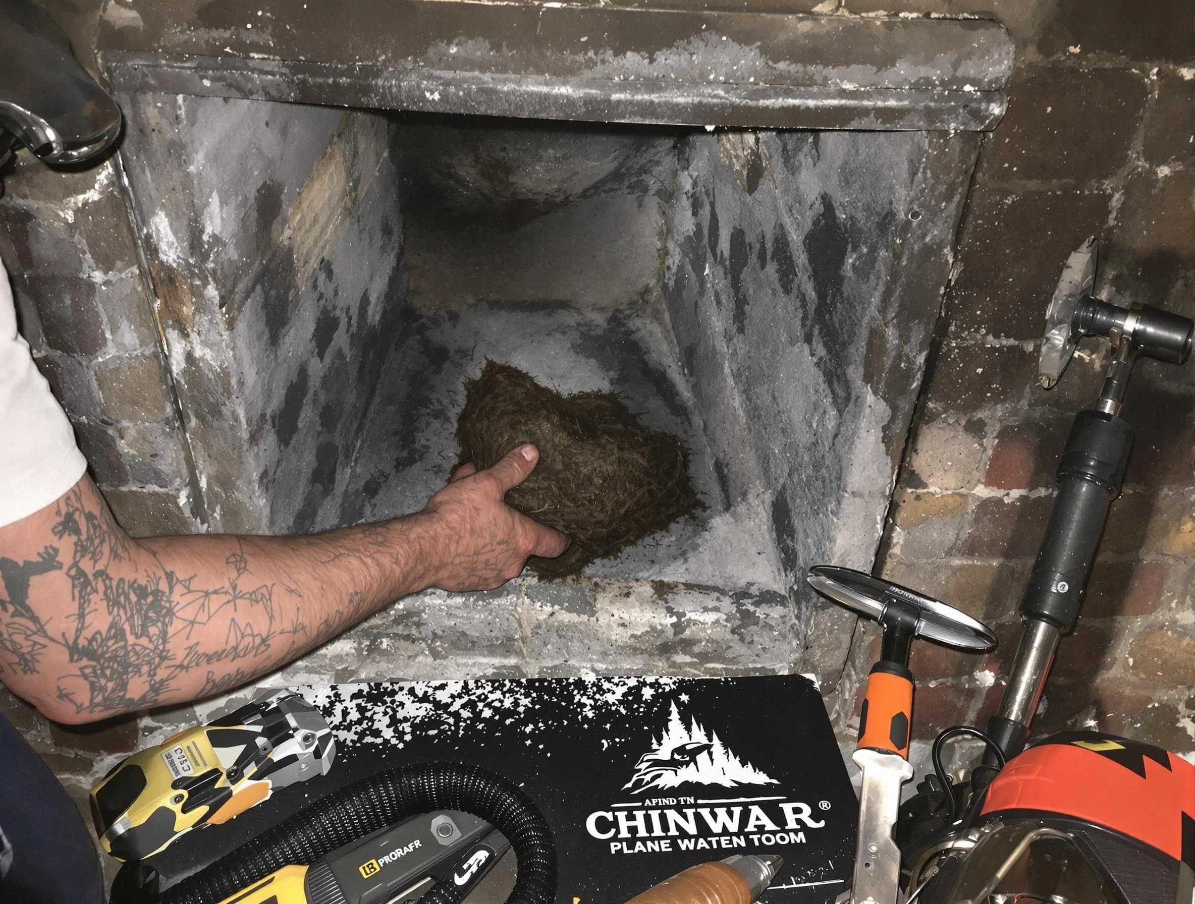 Goodyear Chimney Sweep safely removing debris and screening chimney in Goodyear, AZ