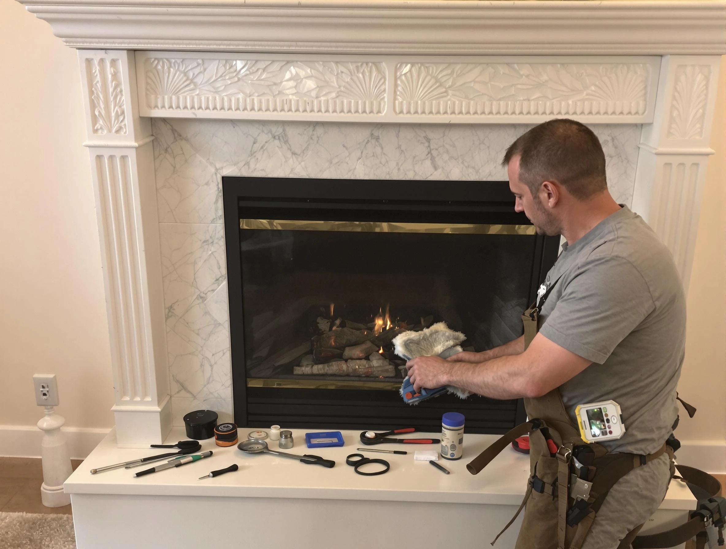 Goodyear Chimney Sweep performing fireplace maintenance in Goodyear, AZ